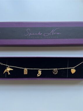 Taylor Swift Official Speak Now TV Gole Tone Charm Bracelet